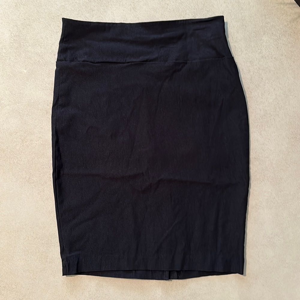 High waisted, versatile, black skirt, and a stretchy material